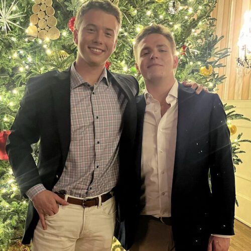 Graham Segars Sepsis Survivor with Friend in front of Christmas Tree